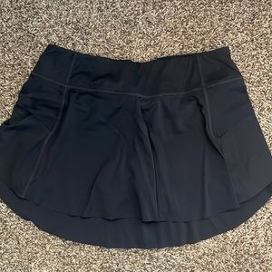 Zyia Active Black tennis skirt with black shorts attached. Size Medium.